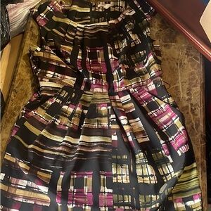 Gorgeous dress perfect for that casual event. Best part ~ Dress has pockets!